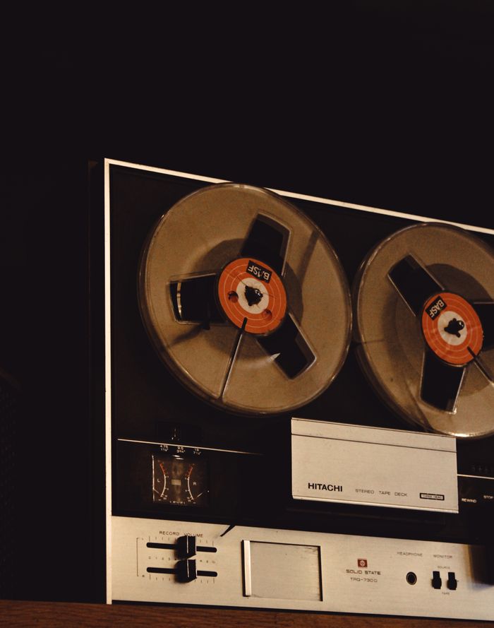 collection-03 Close-up of a classic reel-to-reel tape recorder, showcasing vintage audio equipment aesthetics.