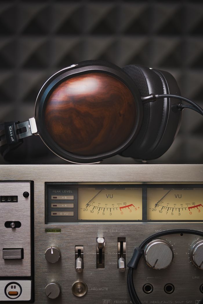 collection-05 Retro-style headphones with classic audio equipment for a nostalgic music experience.
